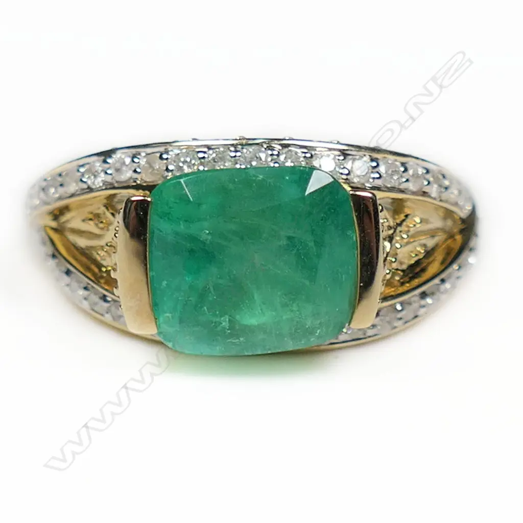 A 14ct gold Colombian emerald and diamond dress ring, Image 1++