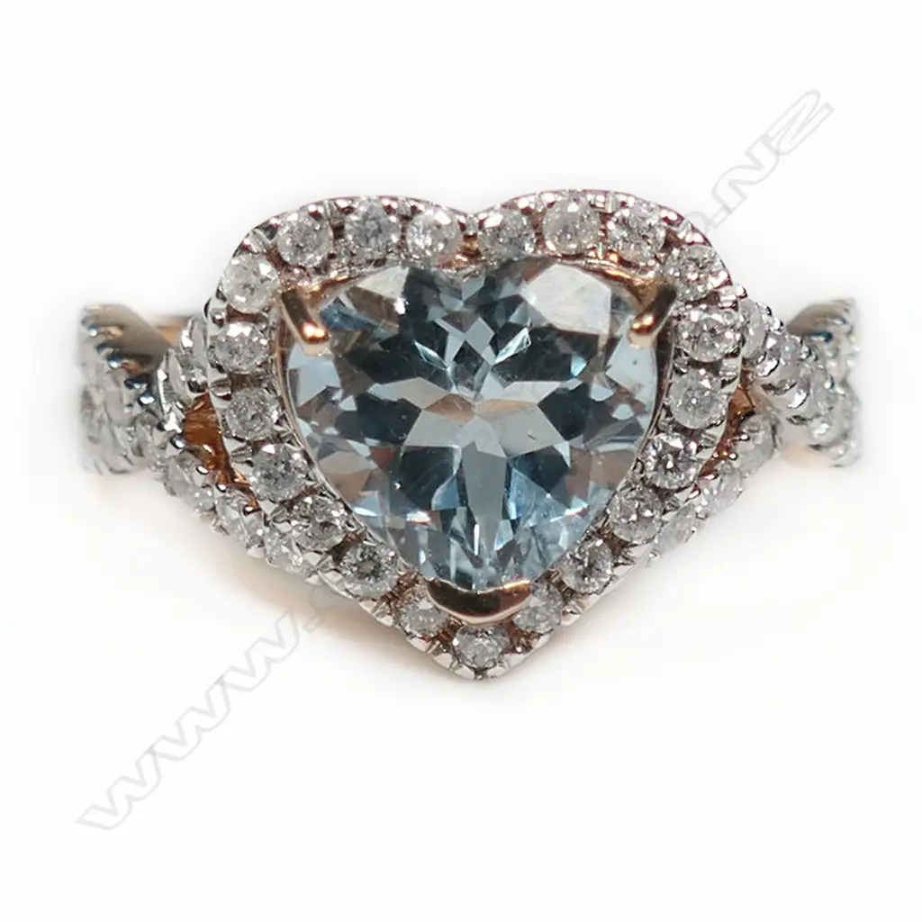 A 14ct rose gold, aquamarine and diamond heart shaped halo ring, Image 1++