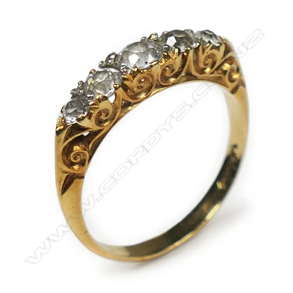 A c.1900 18ct yellow gold five stone diamond bridge ring, Image 1++