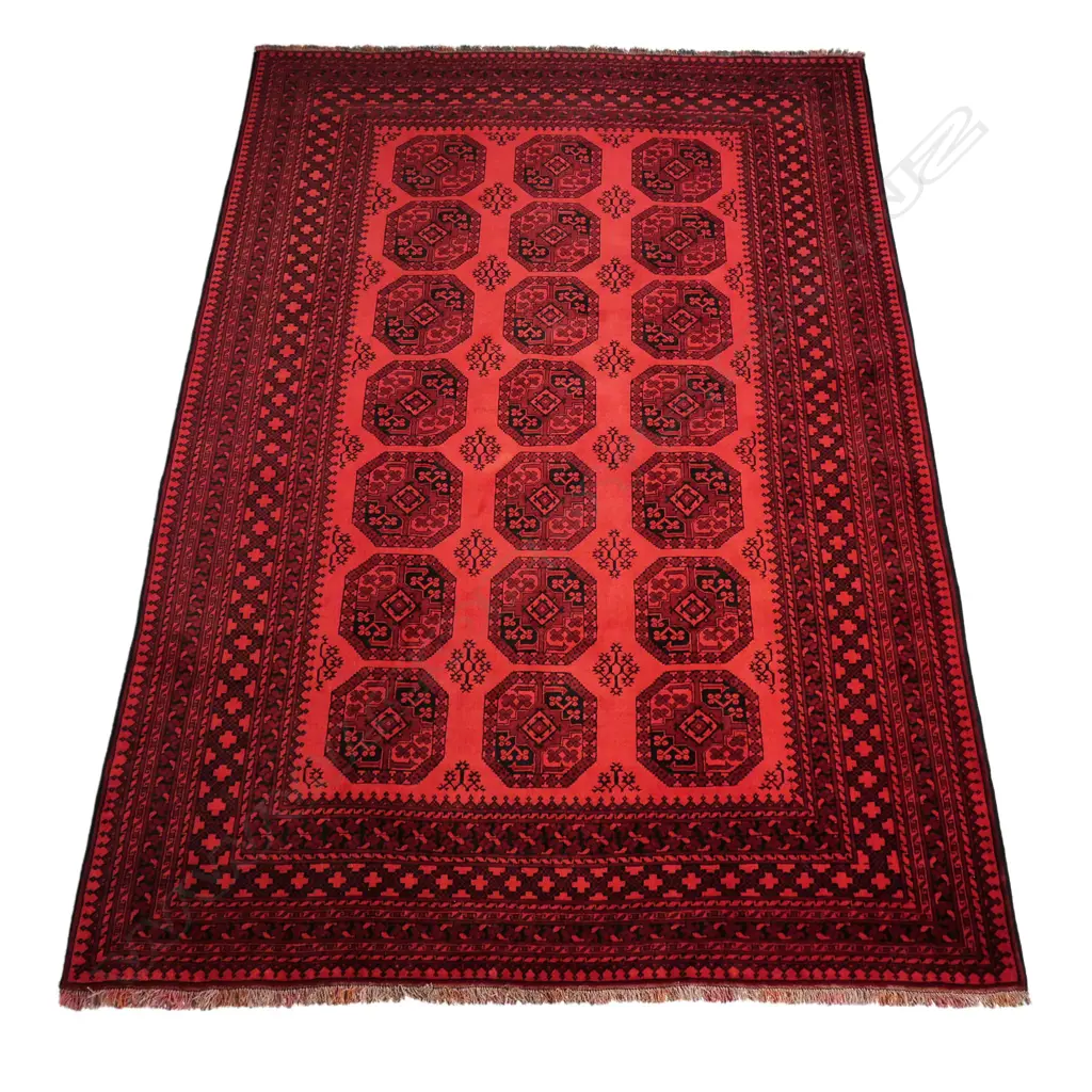An old Ersari carpet the field decorated with numerous patterned octagonal medallions on a red ground, multiple border guards, red and black colourway. 2000 x 2850mm. Image 1++