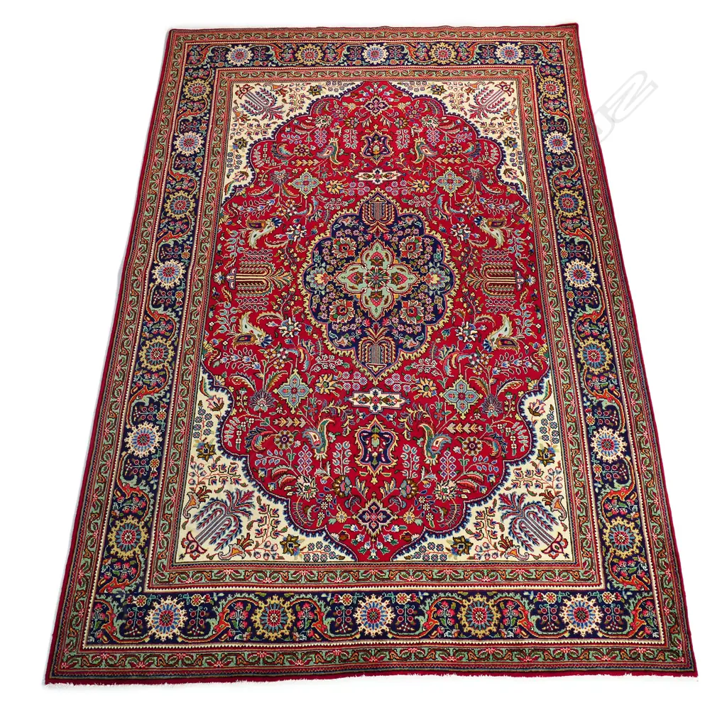 An Iranian hand-knotted Tabriz carpet, Image 1++