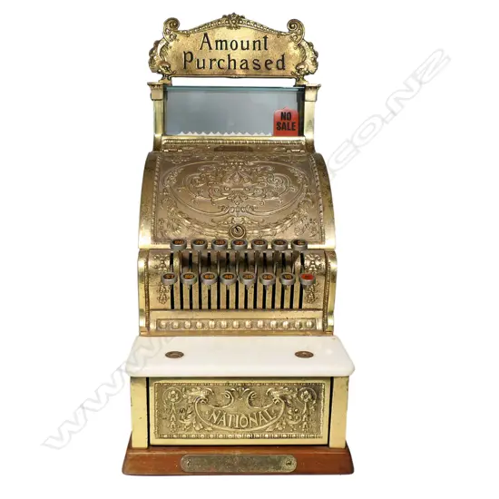 An early 20thC 'National' gilt metal small fancy cash register,
