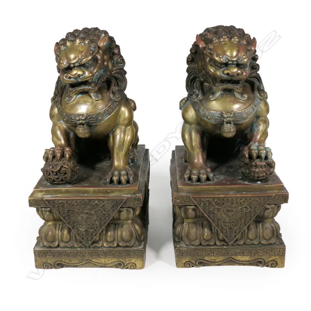 A pair of impressive and well modelled vintage Chinese bronze Foo dogs, Image 1++