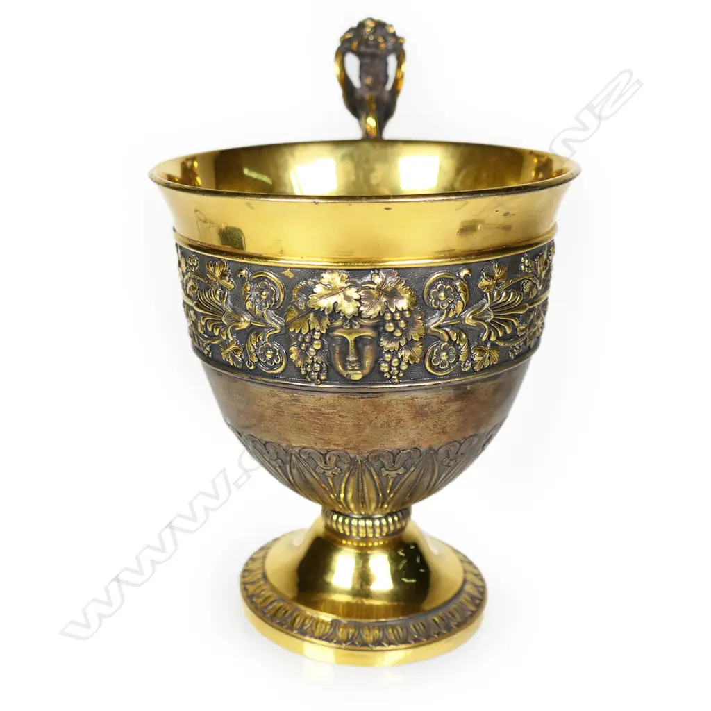 A French Charles X silver gilt vermeil cup in case, Image 1++