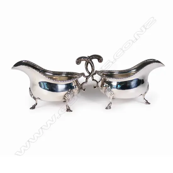 A pair of early 20thC silver sauce boats,