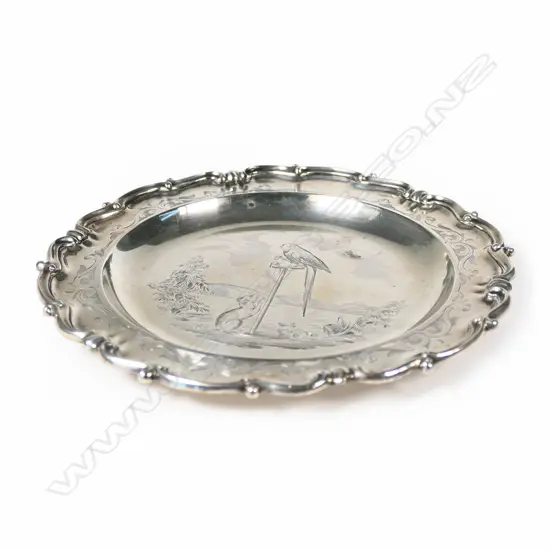 A Victorian silver dog and bird engraved waiter,