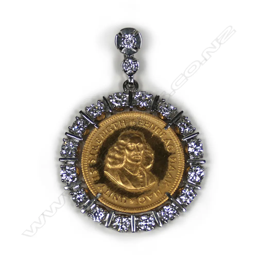 A gold coin and diamond 18ct white gold pendant Image 1++