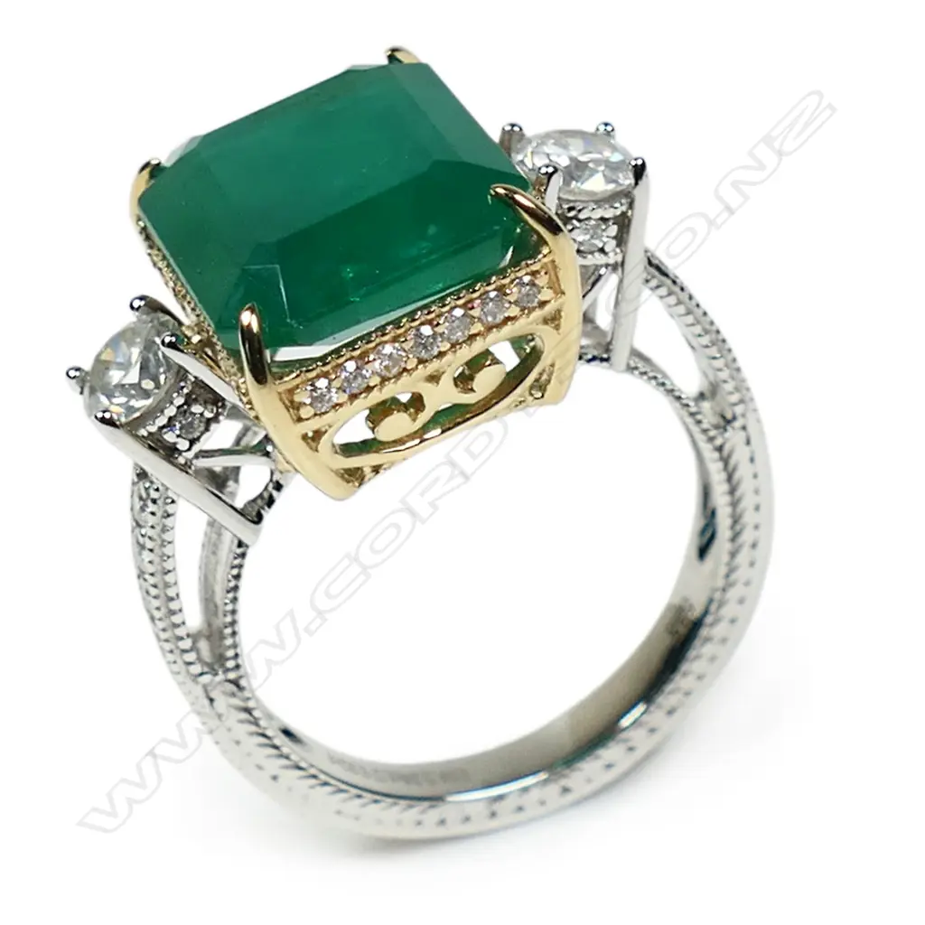 A 14ct white and yellow gold emerald and diamond trilogy ring, Image 1++