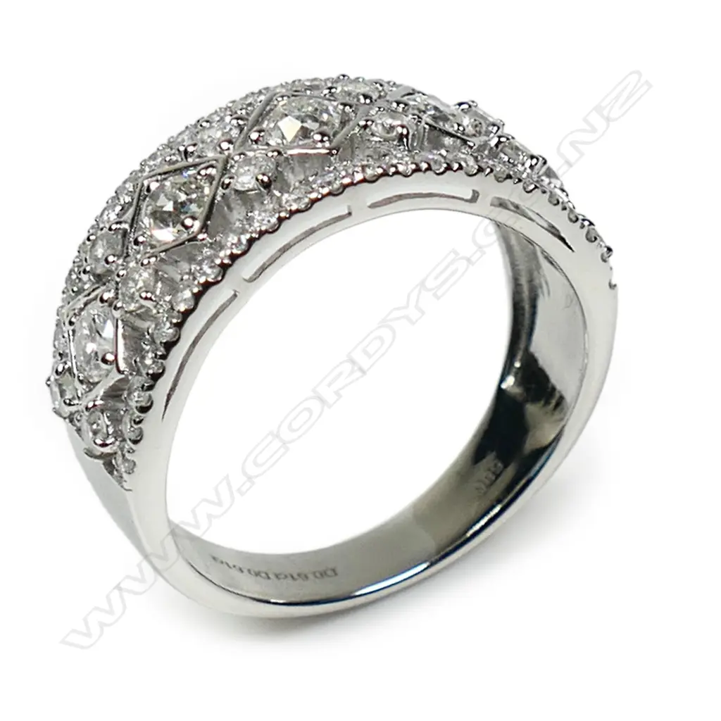 A 14ct white gold and diamond band, Image 1++