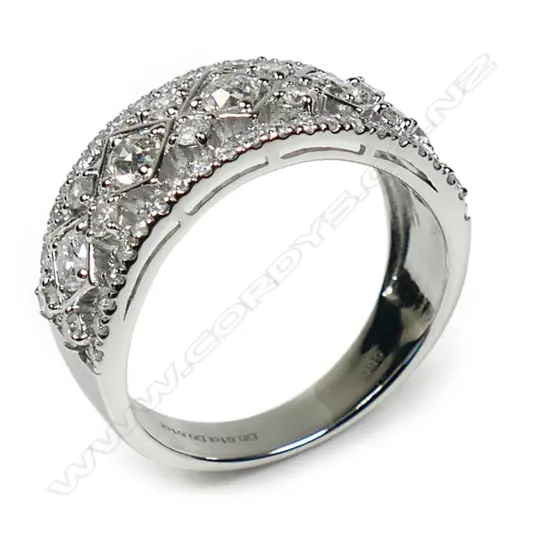 A 14ct white gold and diamond band,