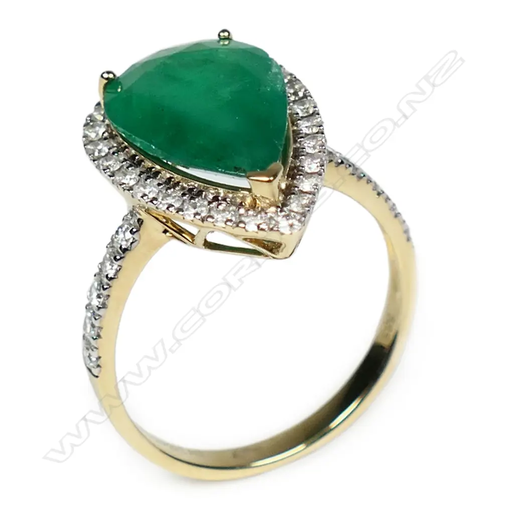 A 14ct yellow and white gold emerald and diamond ring, Image 1++