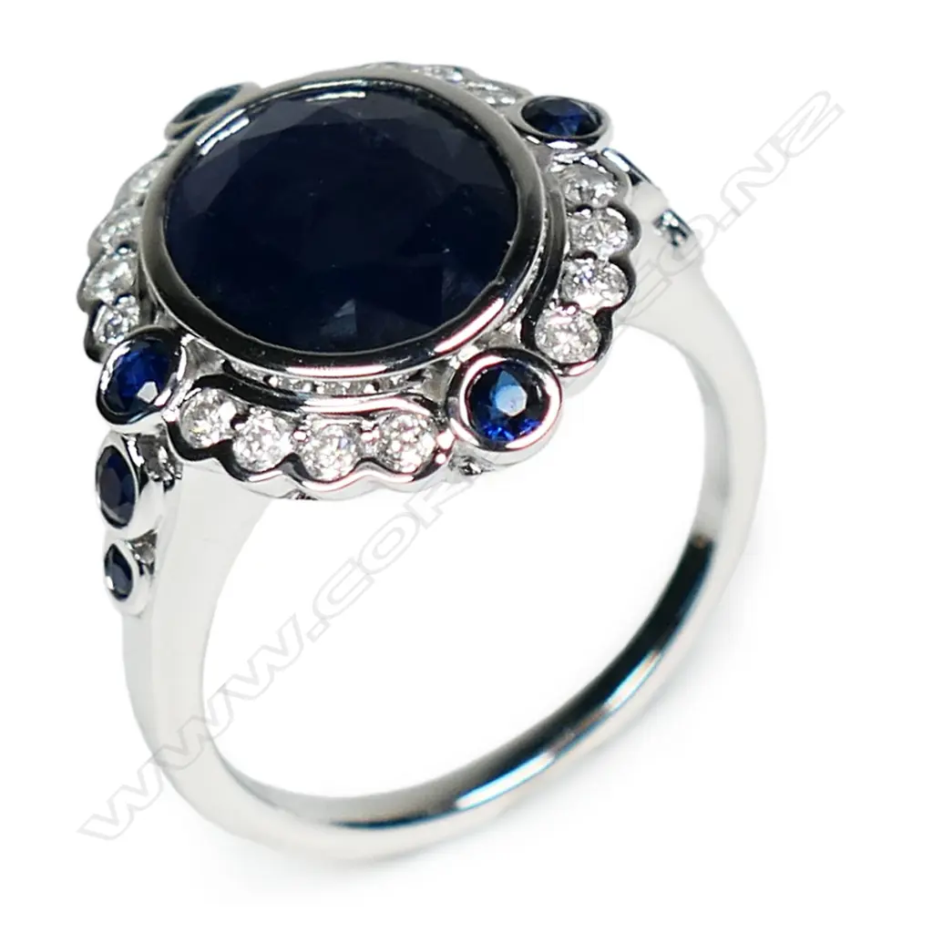 A 14ct white gold sapphire and diamond vintage style ring, Image 1++