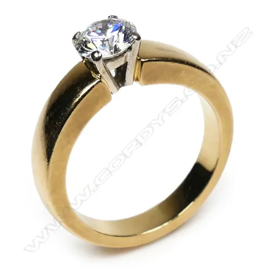 An 18ct yellow gold diamond solitaire ring,