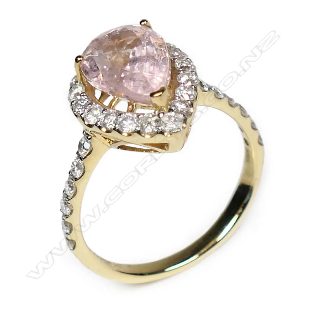 A 14ct gold morganite and diamond halo ring, Image 1++