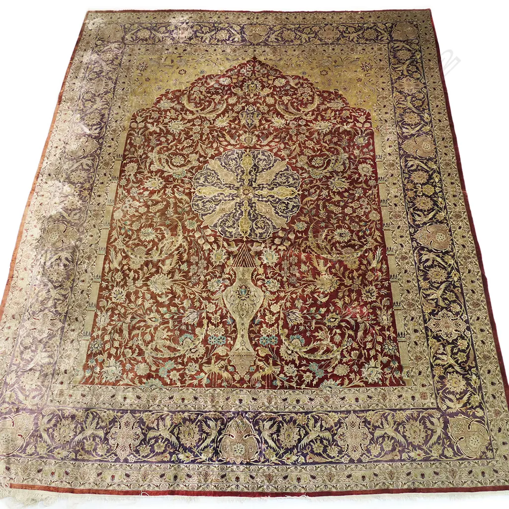 A large hand-knotted silk carpet Image 1++