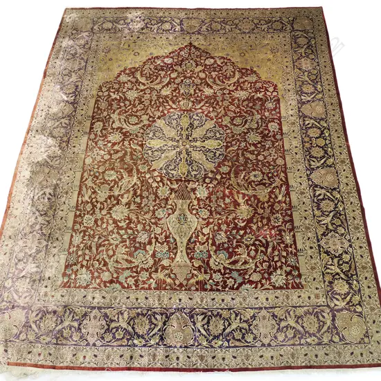 A large hand-knotted silk carpet