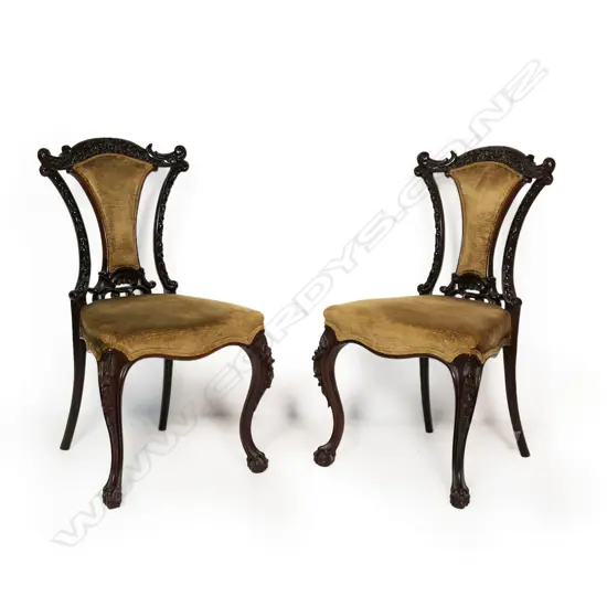 A pair of Victorian rosewood dining chairs,