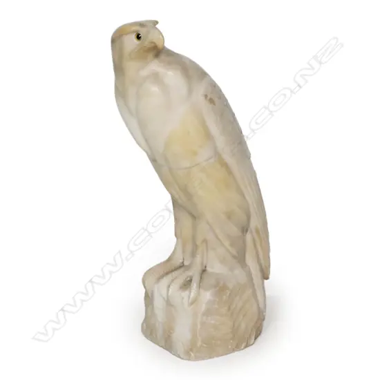 An early 20thC alabaster carved eagle,