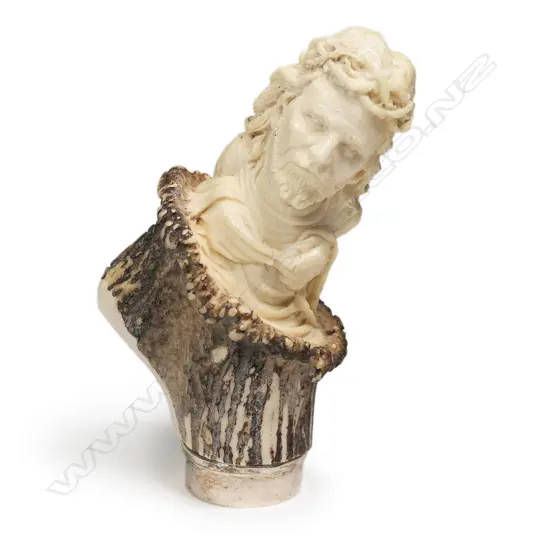 A vintage antler walking stick handle,