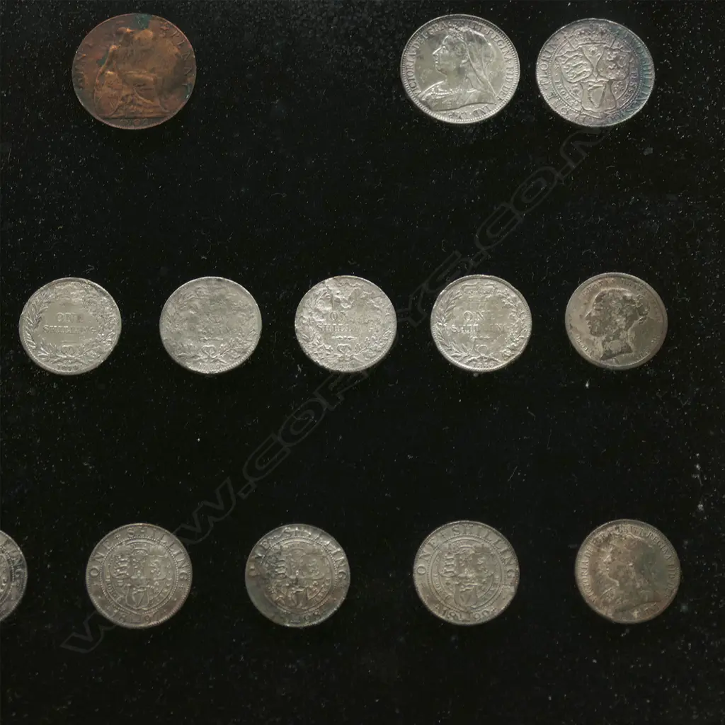 An impressive framed display of eight gold and other silver coins from the historical New Zealand 'Elingamite' shipwreck Image 1++