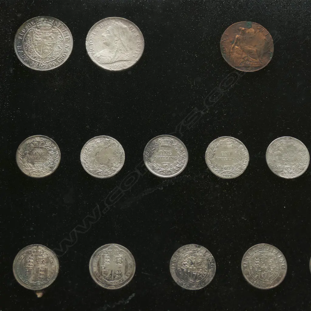 An impressive framed display of eight gold and other silver coins from the historical New Zealand 'Elingamite' shipwreck Image 1++