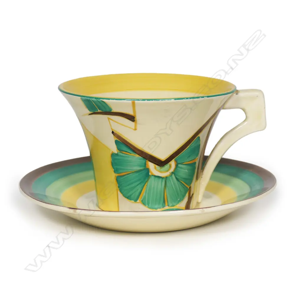A Clarice Cliff Fantasque Bizarre cup and saucer, Image 1++
