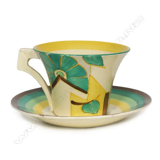 A Clarice Cliff Fantasque Bizarre cup and saucer,