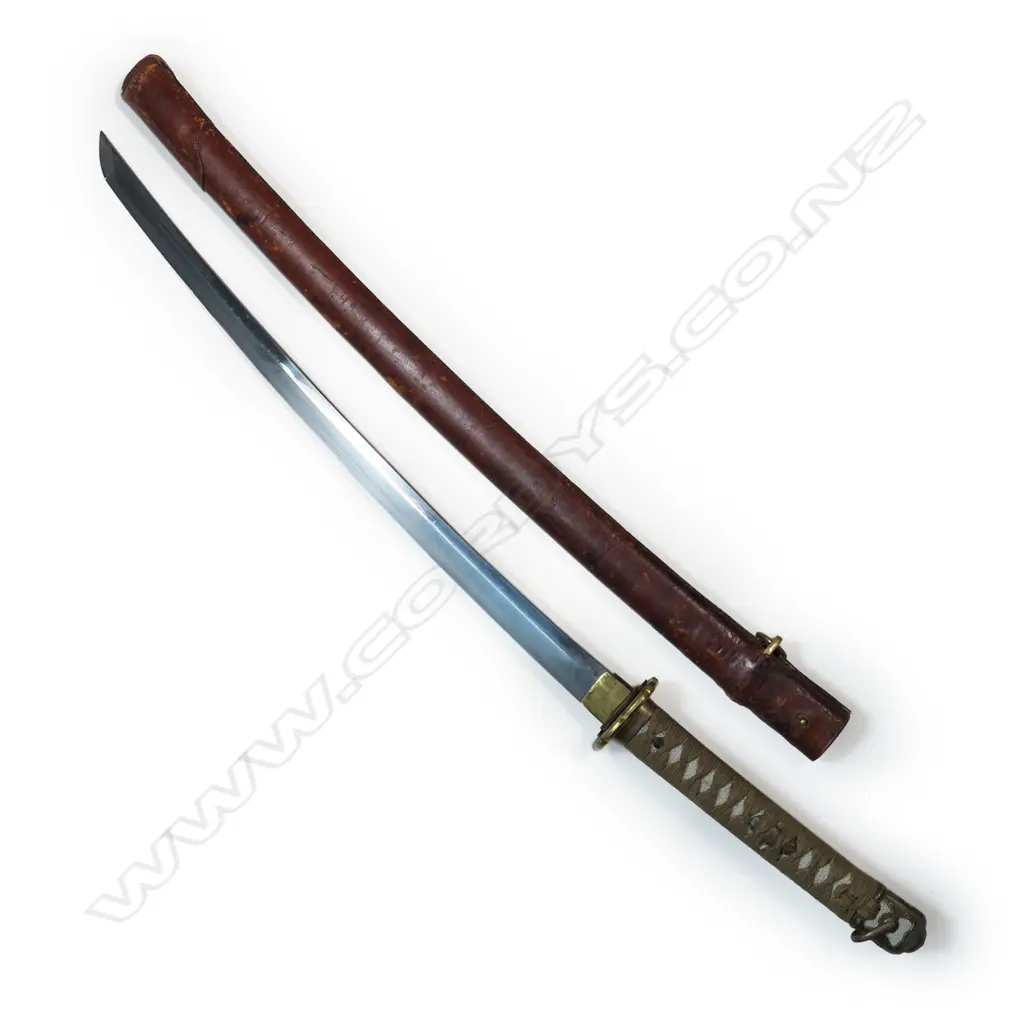 A Japanese WWII katana sword in scabbard, Image 1++
