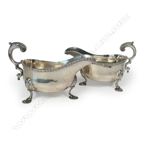 A pair of good heavy gauge George IV silver sauce boats,