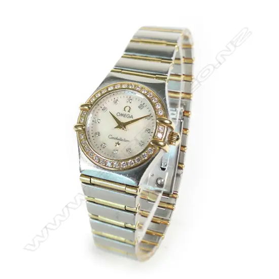 An 18ct gold and stainless ladies Omega Constellation wristwatch,