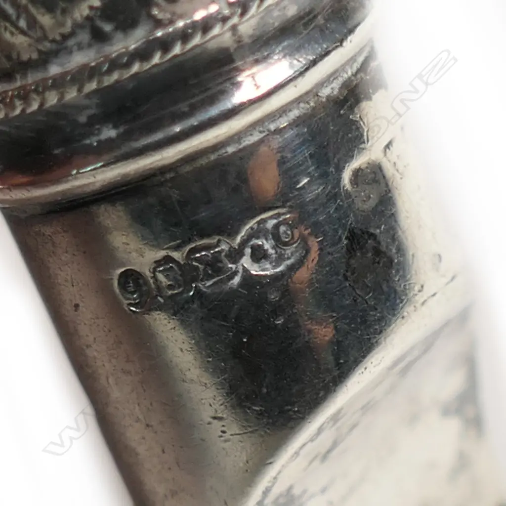 An early 1900s silver whistle, Image 1++