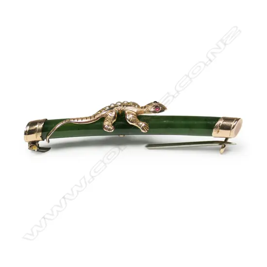 A colonial 9ct rose gold and pounamu brooch,