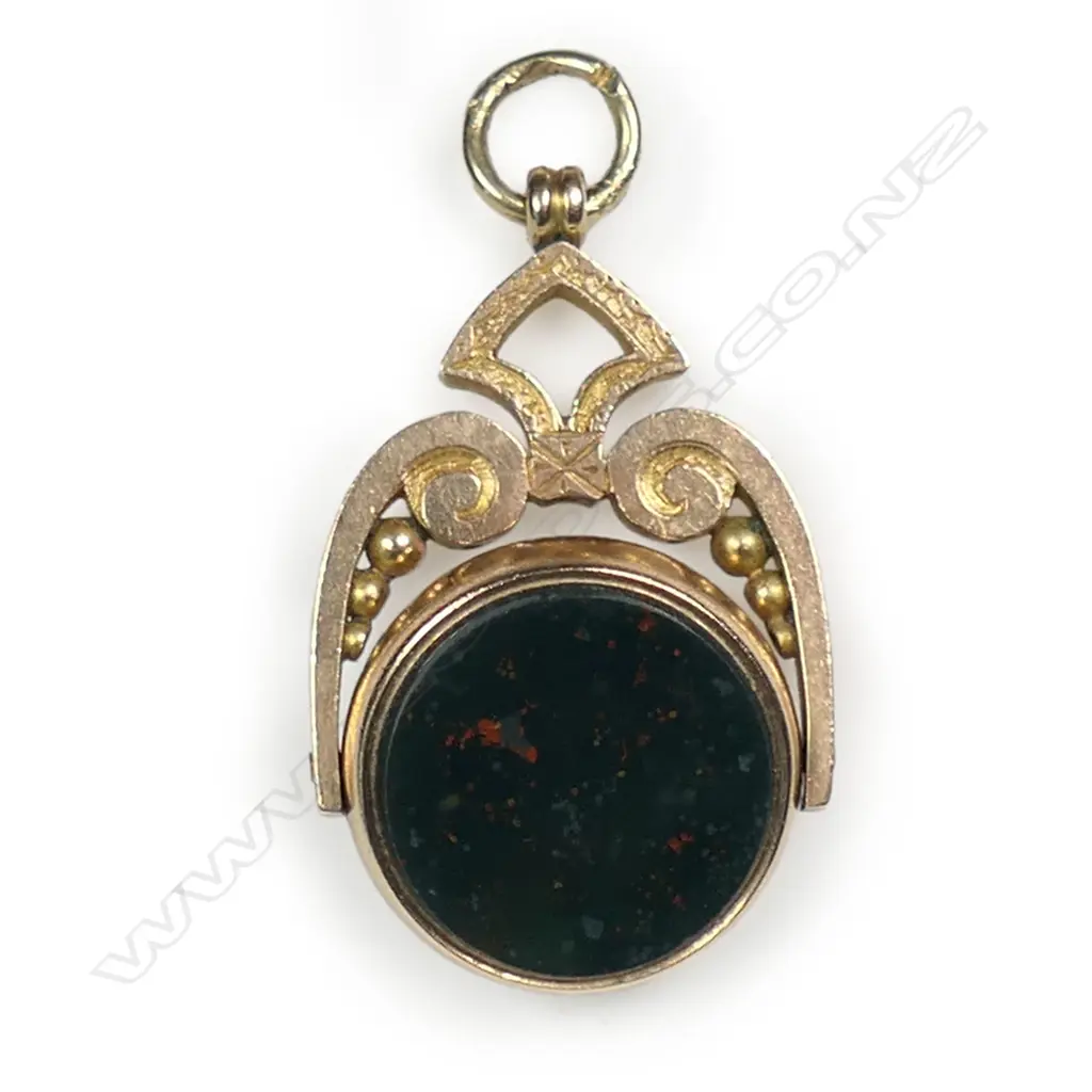 A Victorian 9ct yellow gold fob spinner, Image 1++