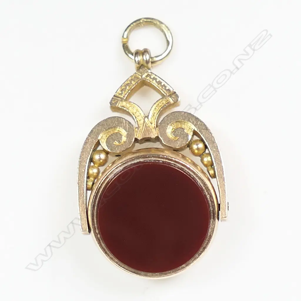 A Victorian 9ct yellow gold fob spinner, Image 1++