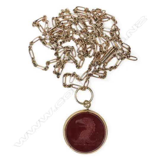 A vintage 9ct rose gold fob chain with 15ct gold fob,