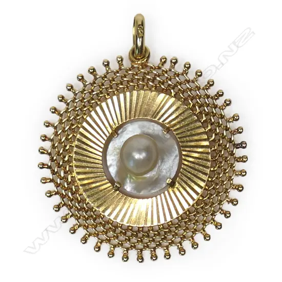 A retro18ct gold and pearl pendant,