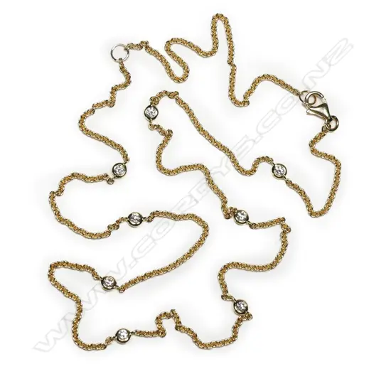 An 18ct gold and diamond set chain necklace,