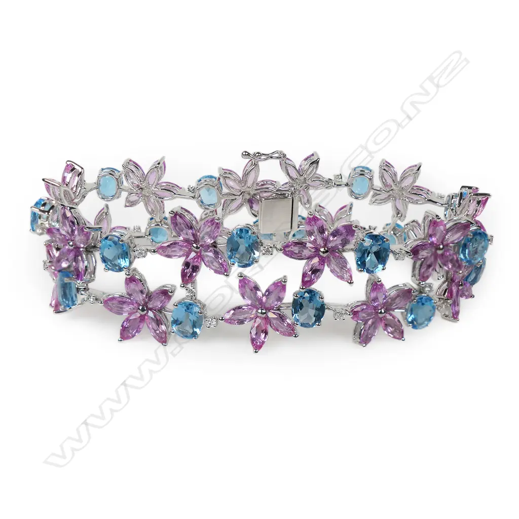 An impressive 18ct white gold diamond, pink sapphire and blue topaz wide bracelet, Image 1++