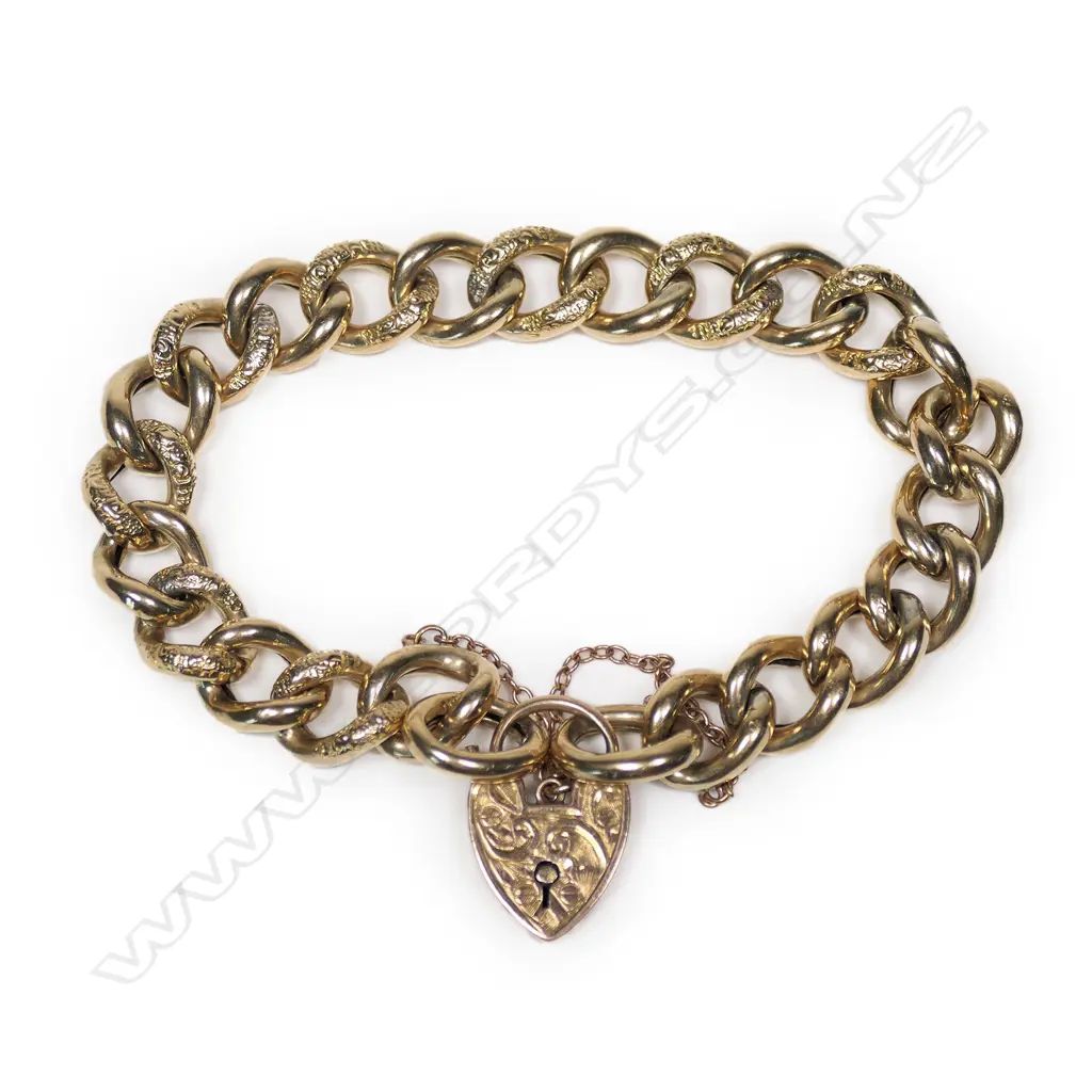 An early 20thC 9ct rose gold curb link bracelet, Image 1++