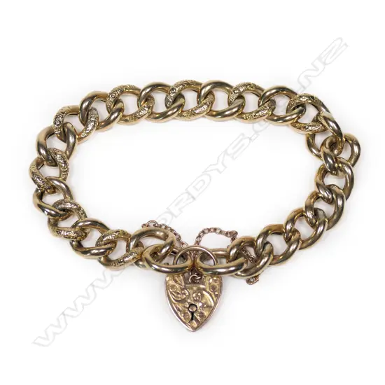 An early 20thC 9ct rose gold curb link bracelet,