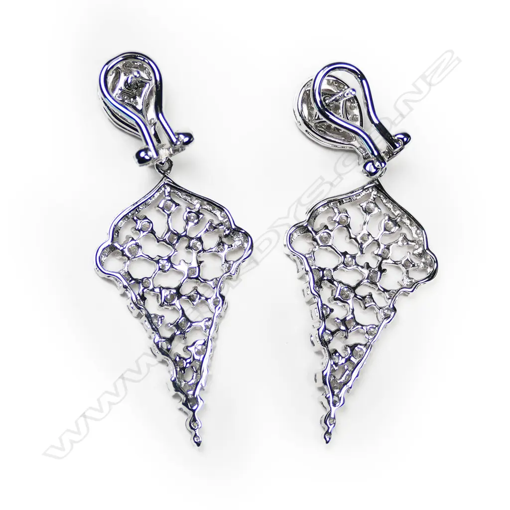 A pair of 18ct white gold and diamond drop earrings, Image 1++