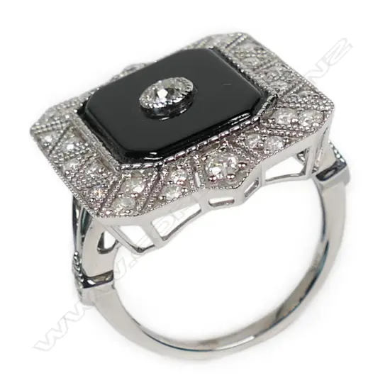 A 14ct white gold onyx and diamond Art Deco style ring,