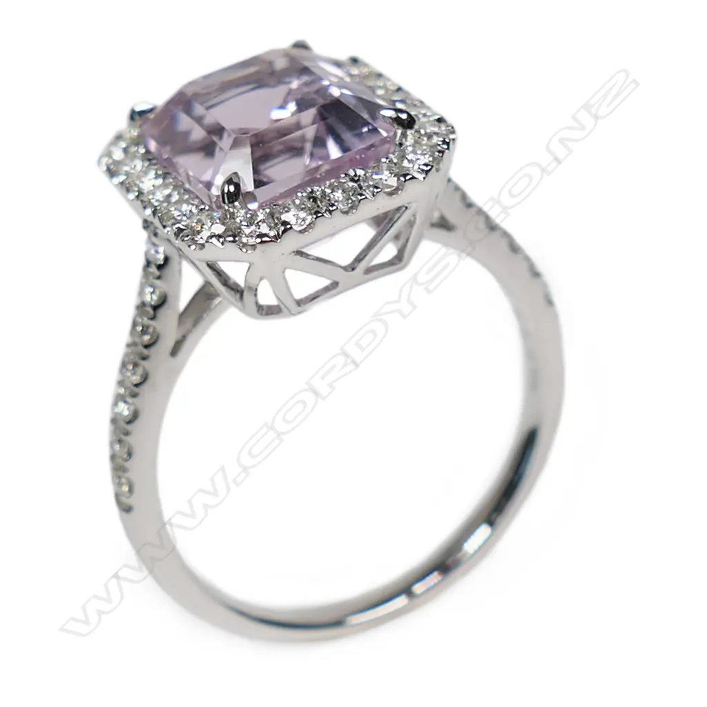 A 14ct white gold kunzite and diamond halo ring, Image 1++