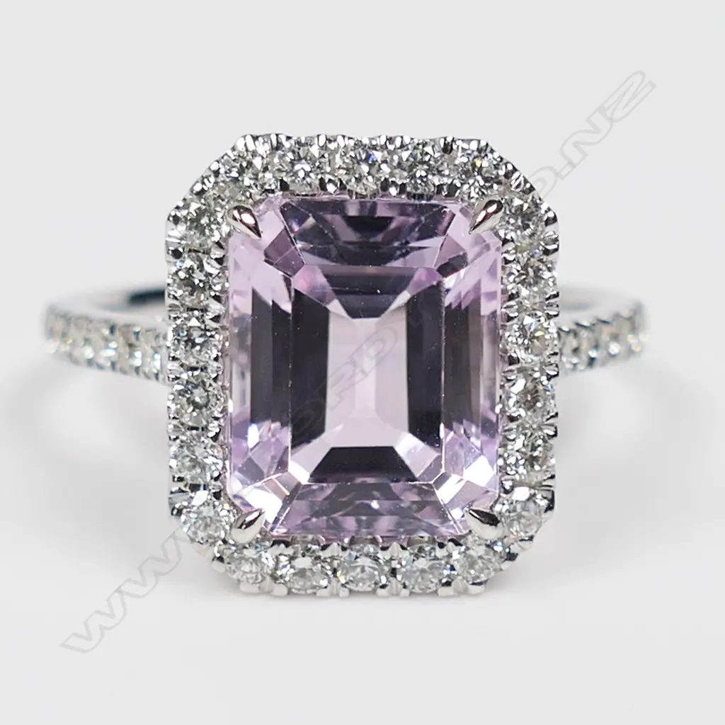 A 14ct white gold kunzite and diamond halo ring, Image 1++