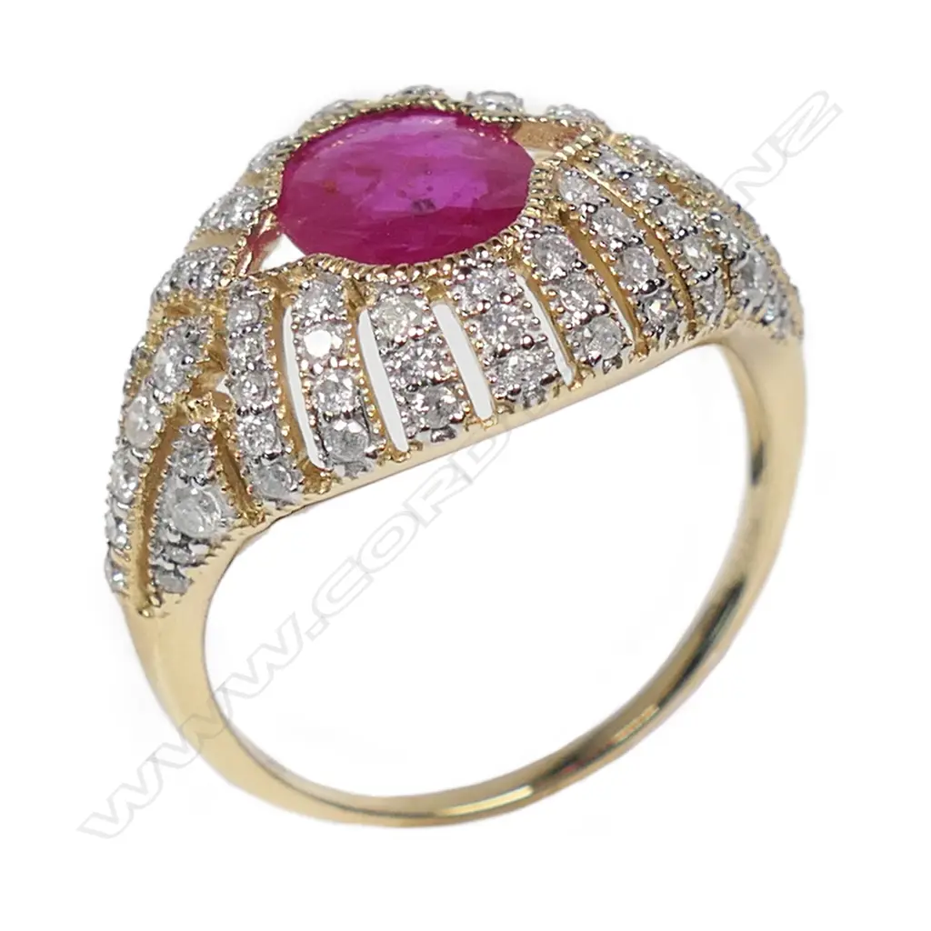 A 14ct gold ruby and diamond cluster ring, Image 1++