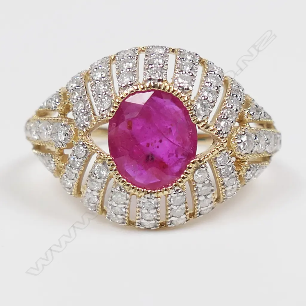A 14ct gold ruby and diamond cluster ring, Image 1++