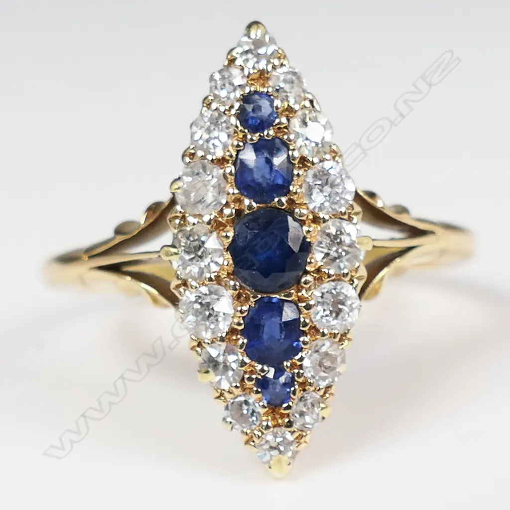 An estate 18ct gold diamond and sapphire ring, Image 1++