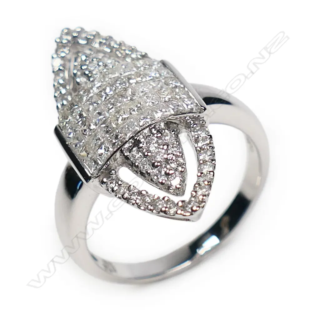 An 18ct white gold and diamond cluster ring of marquise form, Image 1++