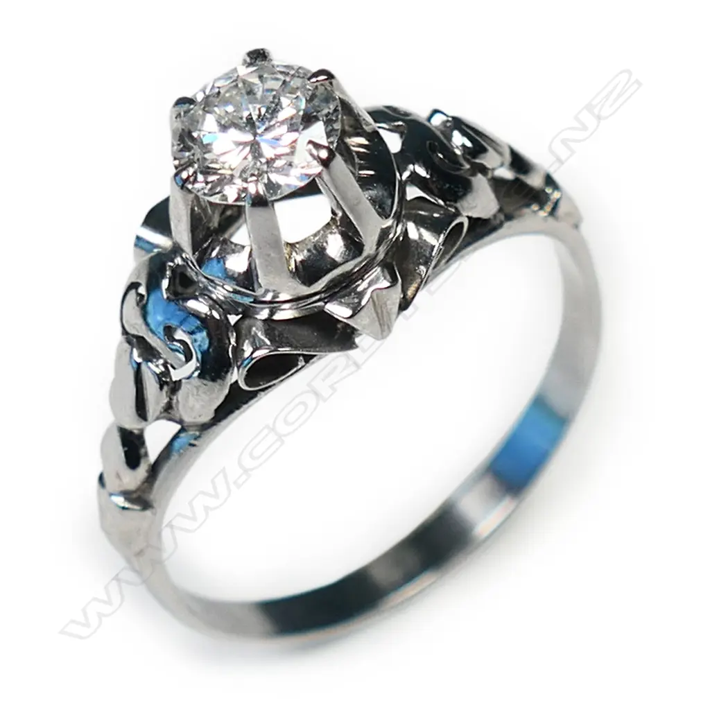 A platinum and diamond solitaire ring, Image 1++