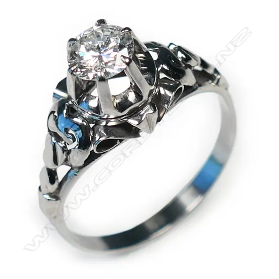 A platinum and diamond solitaire ring,